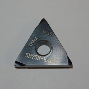 A triangle shaped cutter with the number 5 8 7 6 e-k 4 9 2