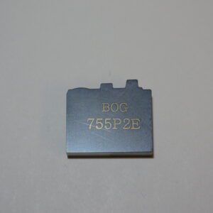 A small piece of metal with the word " bug 7 5 5 9 2 b ".