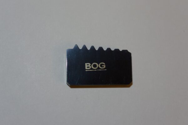 A black plaque with the word " bog " on it.